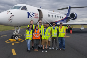 Illinois professor Bob Rauber, far right, University of Oklahoma (and former U of I) professor Greg McFarquhar, third from left, along with students from both universities, pause for a photo in Hobart, Tasmania, an Australian state. From there they studied clouds via a research airplane from the National Center for Atmospheric Research and National Science Foundation. (Image courtesy of Bob Rauber.)