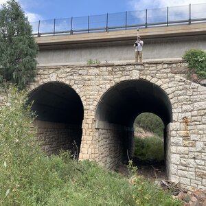 Sean Matus surveying a bridge in Colorado